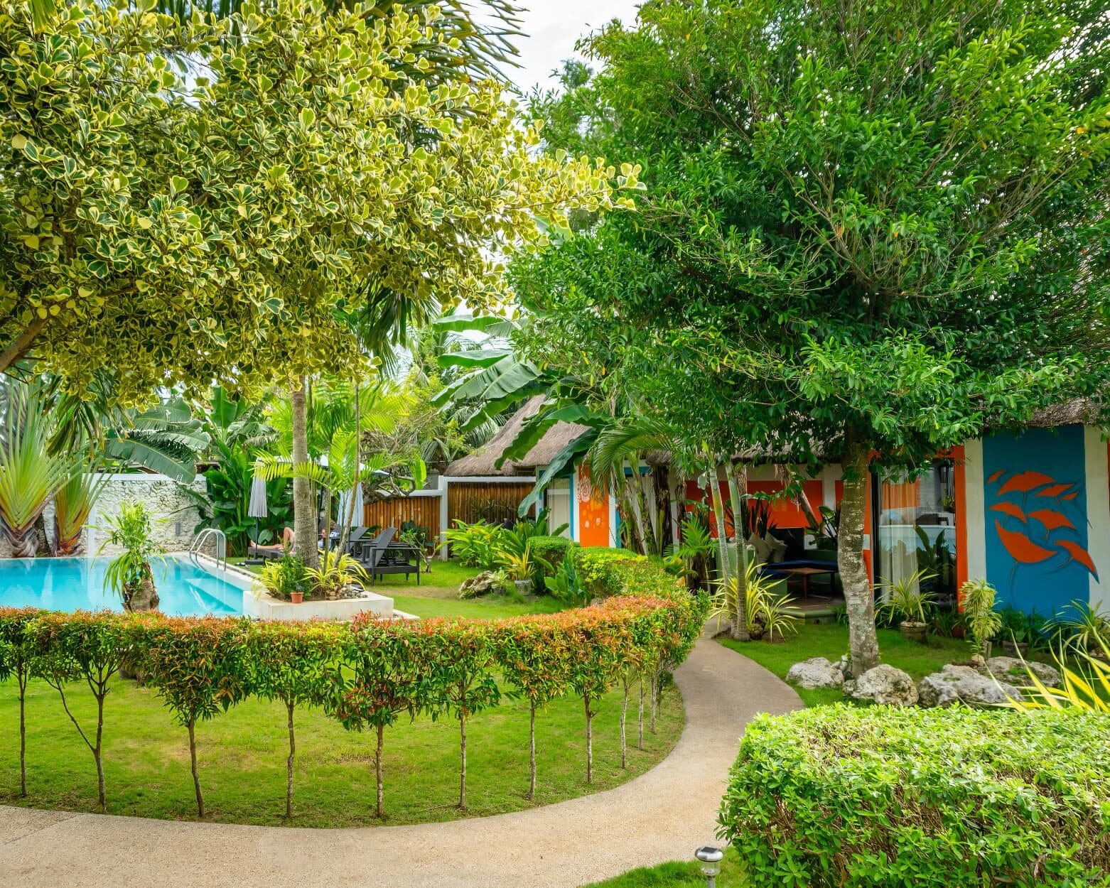 Garden path winding past the cottages